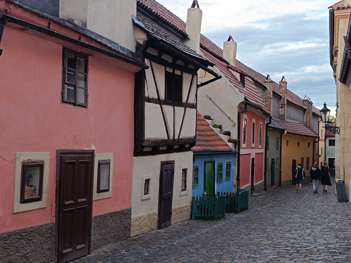 Golden Lane Prague Castle — colourful historic houses on cobblestone street after hours