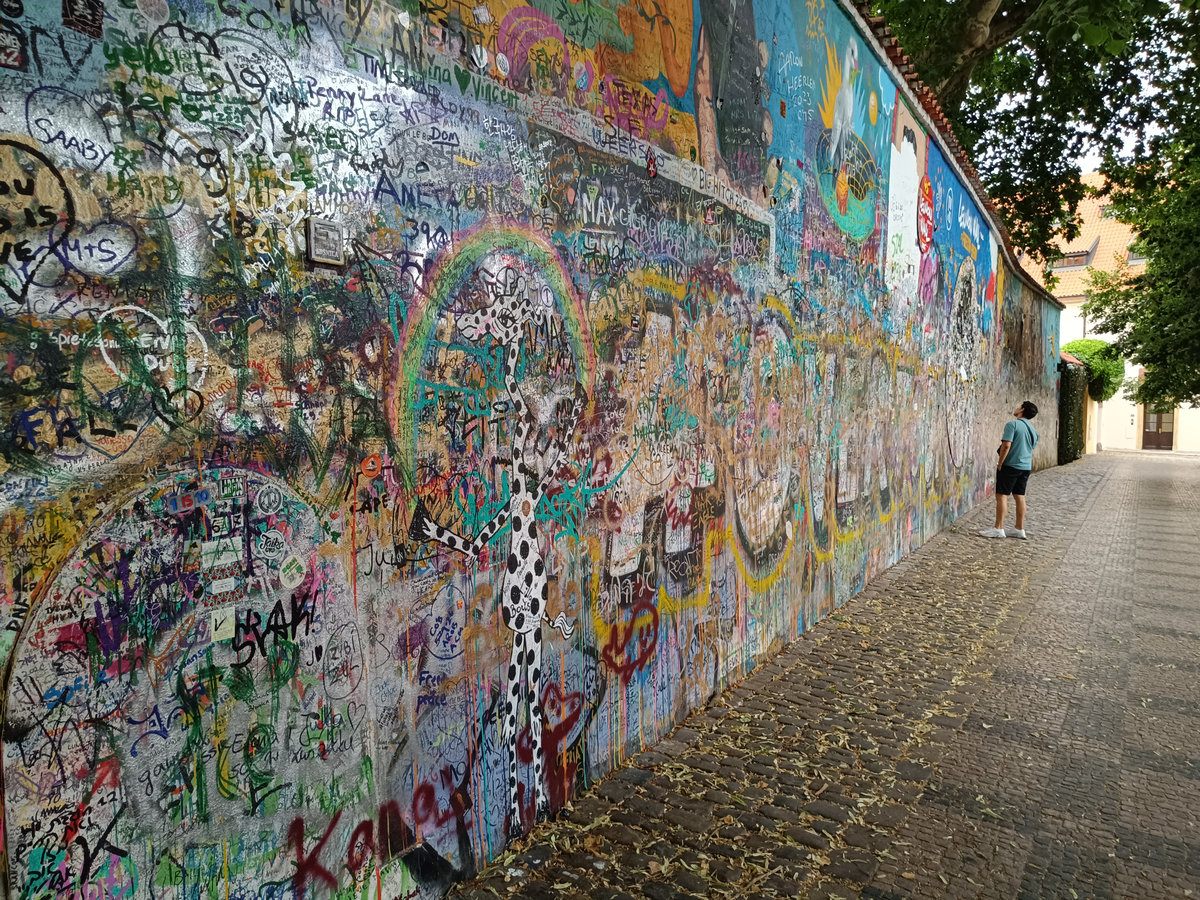 John Lennon Wall Prague 2026 with giraffe graffiti