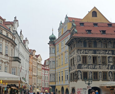 The House at the Minute (Dům U Minuty) featuring black and white sgraffito facades in Old Town Square, Prague.